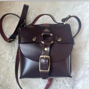 Zana Bayne oxblood and brass purse
